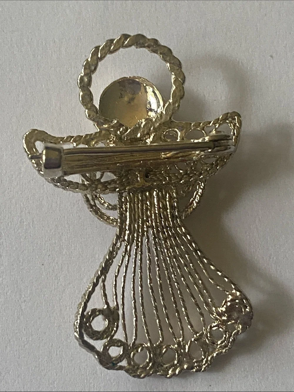Silver tone vintage angel brooch